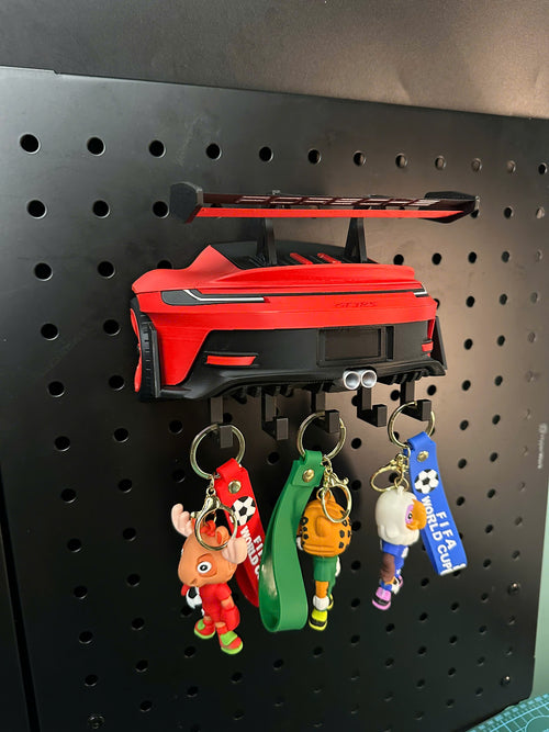 Bought this as a gift for my husband because he is obsessed with cars. The personalized plate with his name made it feel so special. He put it up in the garage immediately.
